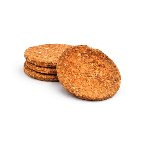 ACE burger snack essiccato per cani, composto da ingredienti naturali come zucca, mela e carota.