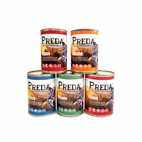 Cinque lattine di Preda umido monoproteico per cani con gusti diversi: manzo, salmone, agnello, anatra e maiale.